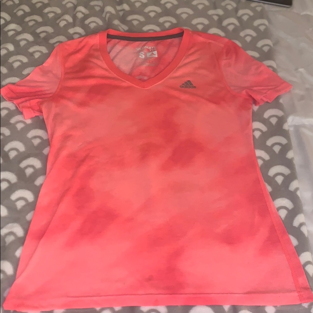 Women’s Tye dye pink adidas shirt.